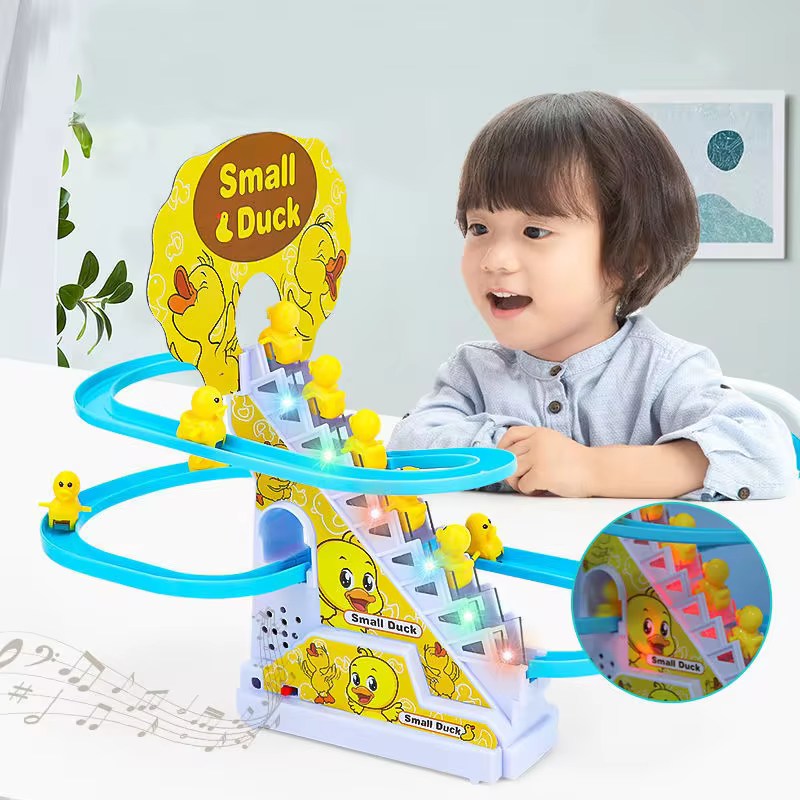 The Climbing Stairs Track is a captivating toy that entertains children with its toy stairs and adorable climbing figures of ducks, penguins, and dinosaurs. These figures automatically ascend the steps and slide down a ramp to cheerful music, providing endless amusement. Easy to assemble, it offers a fun, interactive experience that stimulates curiosity and imagination while encouraging motor skills development. Perfect for engaging playtime fun.