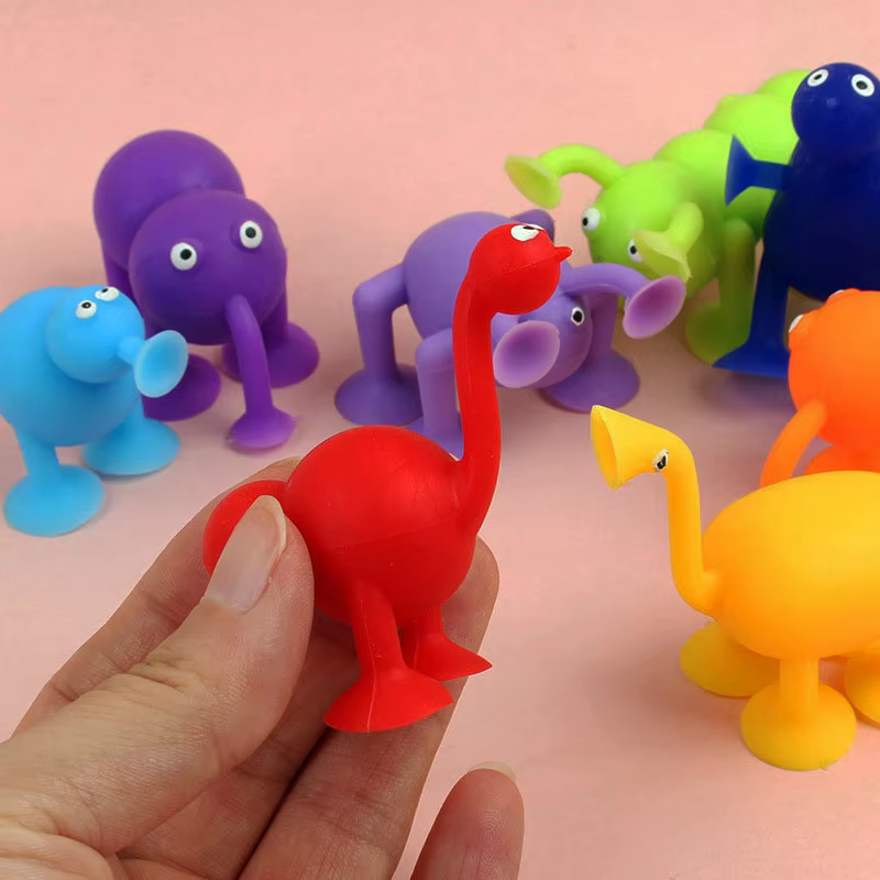 Bring playful fun to any surface with Mini Monsters Shaped Suction Cup Toys! Made from durable silicone, these whimsical toys come in vibrant colors and feature suction cups on their limbs to stick to windows, walls, and each other. Ideal for bath time, playtime, or interactive fun, they come in packs of 9 or 16 pieces, offering endless playful scenarios.